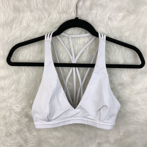 white strappy back sports bra